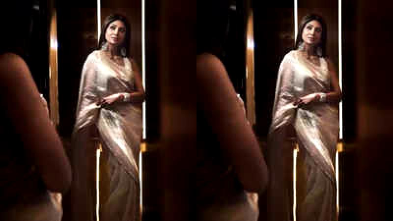 Fans are left in awe over Shilpa Shetty's stunning golden saree ensemble.